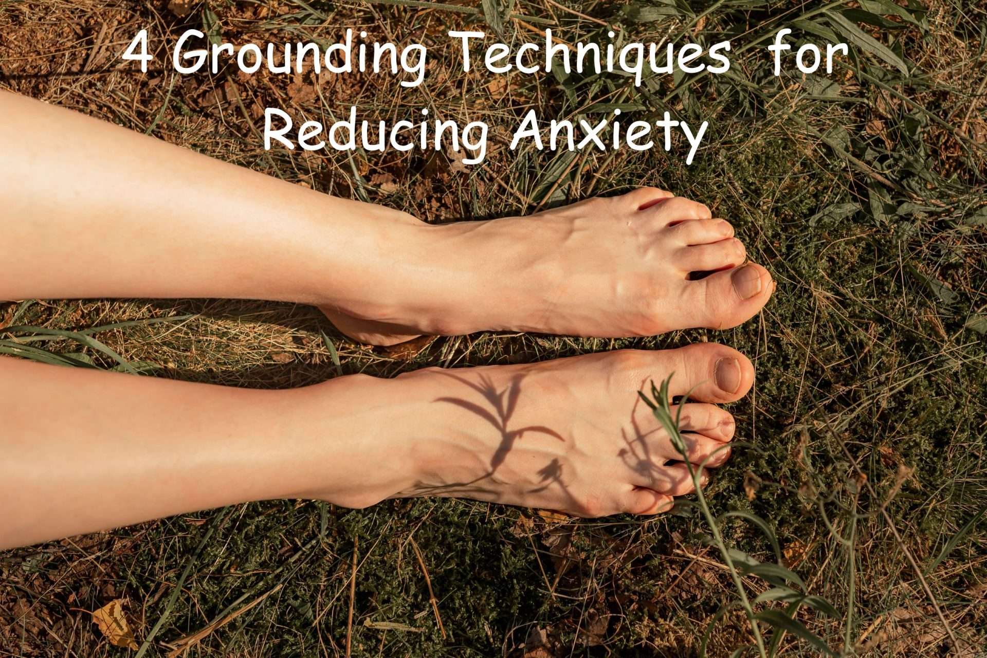 A person's feet sitting in dirt and grass touching the ground with the title: "Grounding Techniques for Reducing Anxiety."